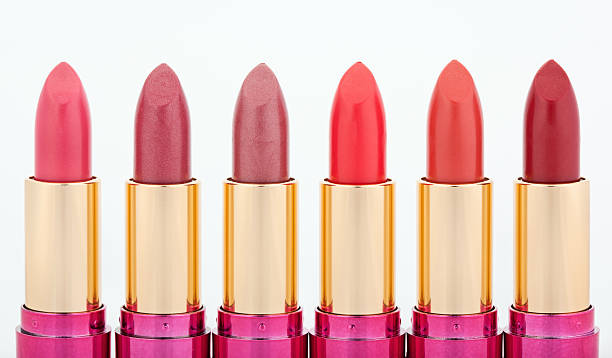 istock Multicolored color lipsticks arranged in line 106415041
