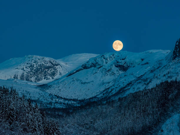 istock The moon at the mountain. 1064151650