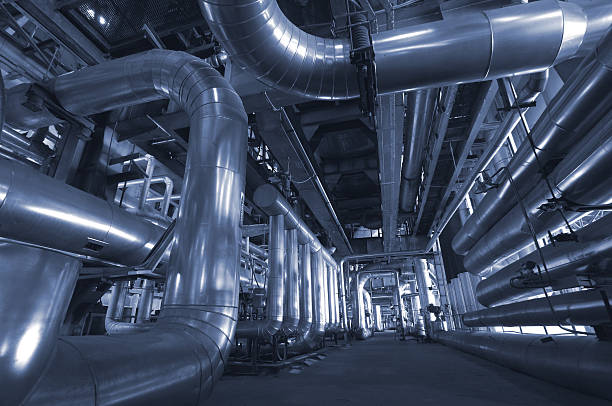 istock Equipment, cables and piping inside of a plant 106415528