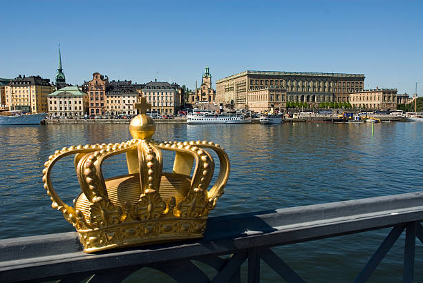 istock Stockholm castle with crown in front and clear blue sky 106416011