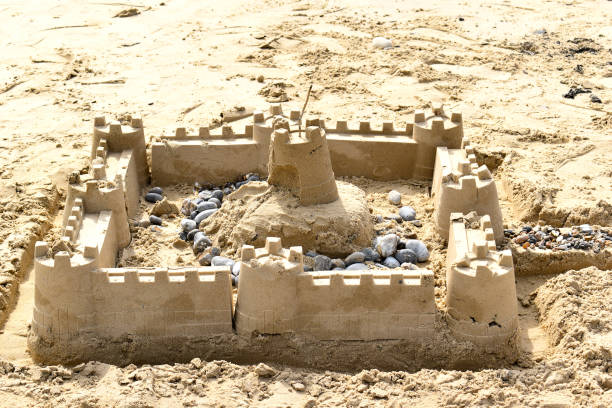 砂の城 - sandcastle beach norfolk sand ストックフォトと画像