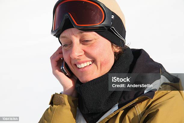 Women Talking In Mobile Phone Skipiste Stock Photo - Download Image Now - Adult, Adults Only, Cap - Hat