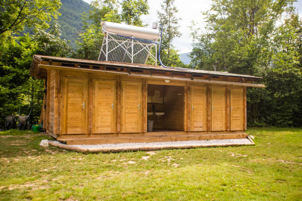 istock Toilet facility area with solar panels for water heating. 1064161814