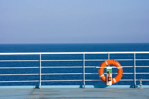 istock Orange life buoy on the side of a ship 106416428