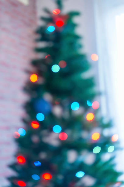 istock Abstract christmas background with defocused lights 1064165002