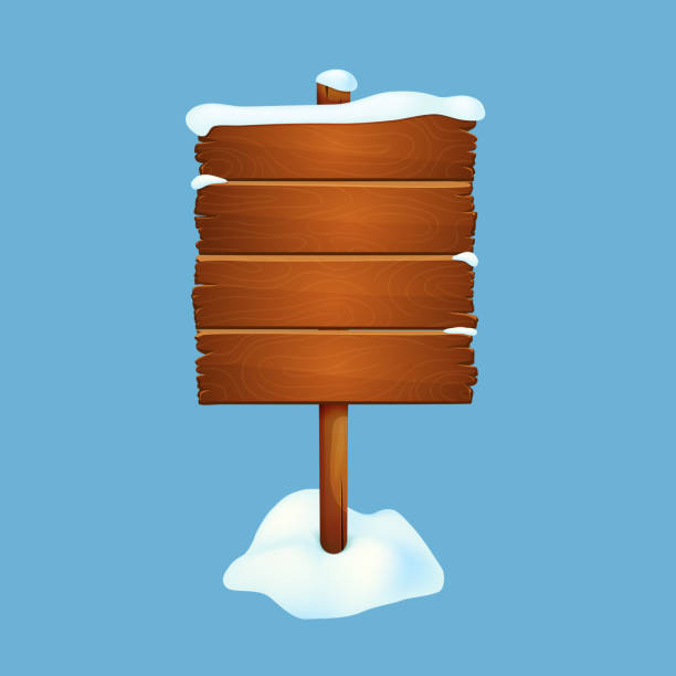 istock Large snow covered wooden sign with snow isolated on a blue background. 1064166604