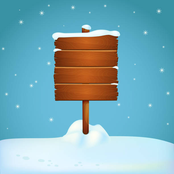 istock Large wooden signpost on the snowy ground with falling snowflakes. 1064167412