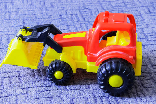 istock big beautiful red and yellow toy bulldozer 1064169028