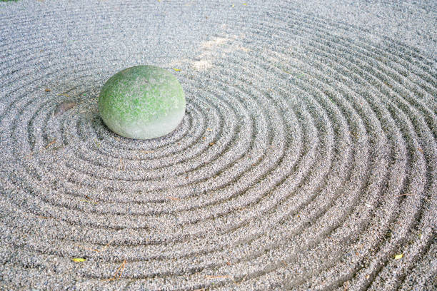 istock Zen garden and stone in Japan 1064169350