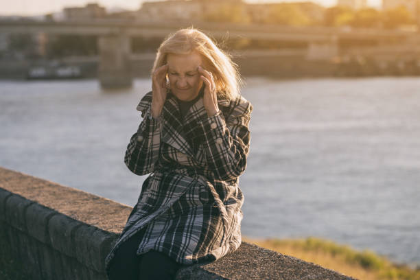 istock Senior woman having headache 1064174578