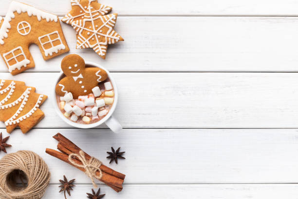 istock Gingerbread cookie man in cup of hot chocolate 1064174676