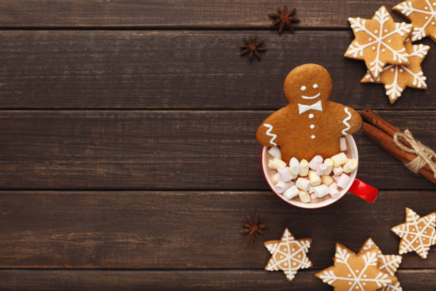 istock Gingerbread man bathing in cup of hot chocolate 1064174684