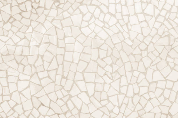 istock Broken tiles mosaic seamless pattern. Cream and Brown the tile wall high resolution real photo or brick seamless and texture interior background. 1064178058