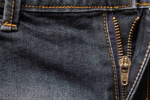 istock Close up of denim jeans texture material background with zipper. 1064186274