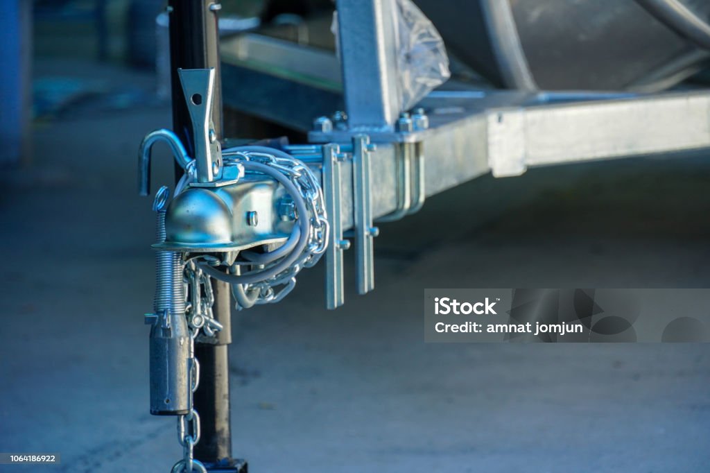 Aluminum boat head Aluminum boat head,Aluminum plated boat trailer hitch isolated Nautical Vessel Stock Photo