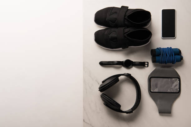 istock view from above of composition with gym equipment on white and marble 1064191186
