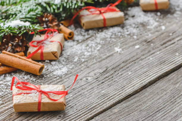 istock Christmas gift box on wooden background 1064192616