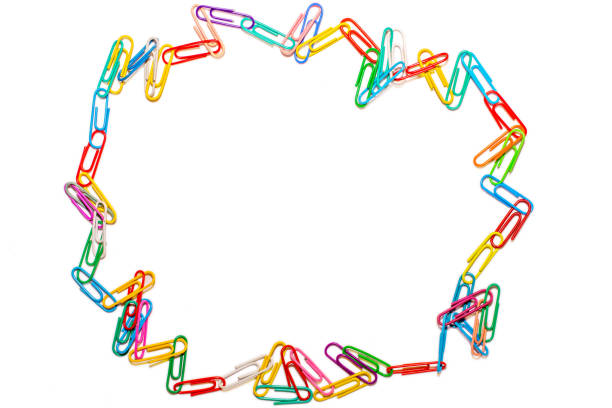 istock Wild circle of colored paper clips on white background 1064192720