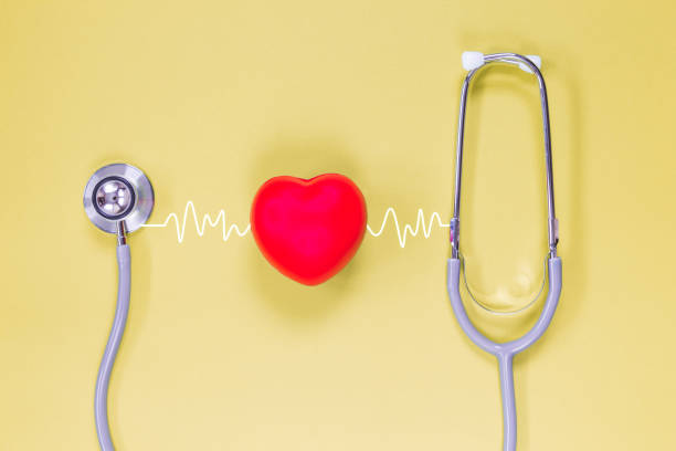 istock stethoscope and red heart with cardiogram 1064195302