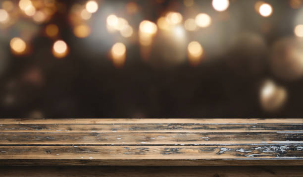 istock Bokeh background with old wooden table 1064195350