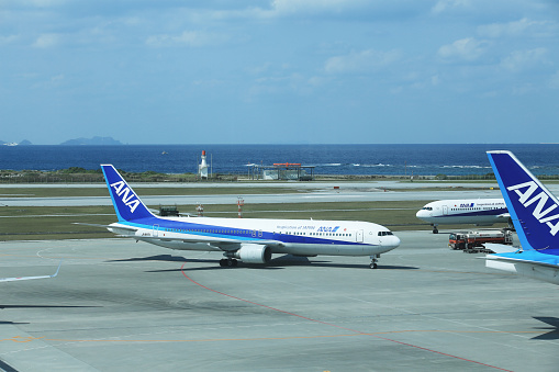 Okinawa, Japan;  January  5 2016: ANA passengers jet are arrived  in Okinawa . All Nippon Airways Co., Ltd also known as Zennikku or ANA, is the largest airline in Japan