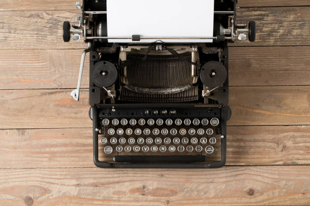 istock Top view of retro style typewriter in studio 1064196640