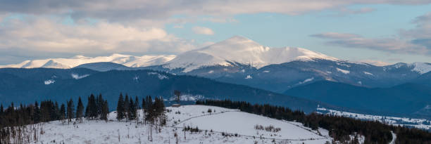 Evening winter cloudy day mountain ridge