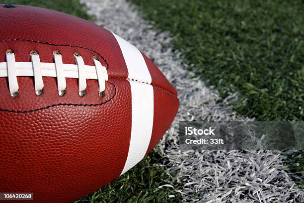Football Close Up On Field Stock Photo - Download Image Now - American Football - Ball, American Football - Sport, American Football Field