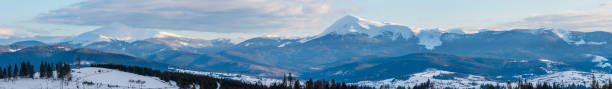 Evening winter cloudy day mountain ridge
