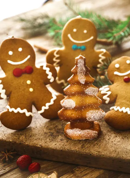 Christmas food. Gingerbread Man cookies in Christmas setting. Xmas dessert. Christmas Table