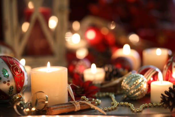 istock Christmas holiday decorations, candles on table. 1064221478
