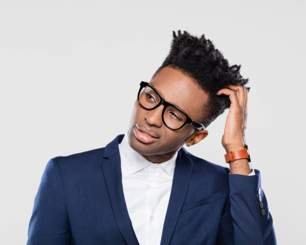 istock Confused afro american businessman looking away 1064221862