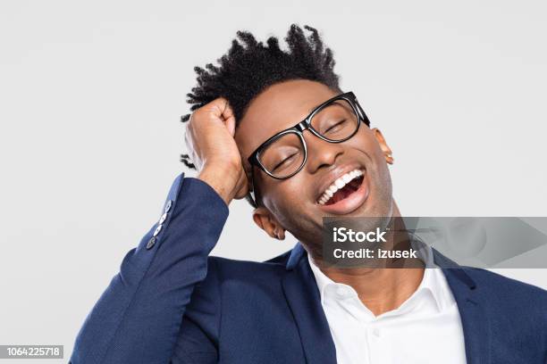Afro American Businessman Laughing Stock Photo - Download Image Now - Cut Out, Eyes Closed, Men