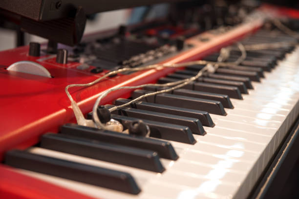 istock the piano on stage in the spotlight. 1064229566