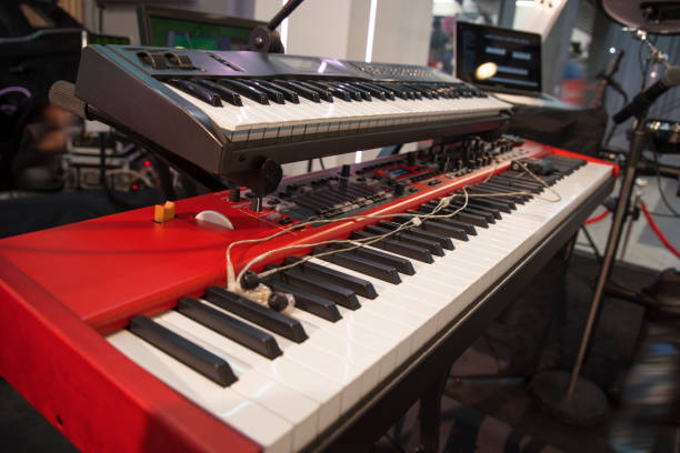 istock the piano on stage in the spotlight. 1064229584