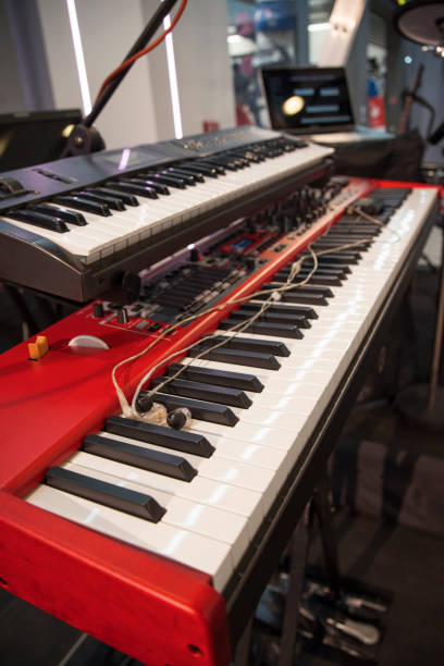 istock the piano on stage in the spotlight. 1064229658