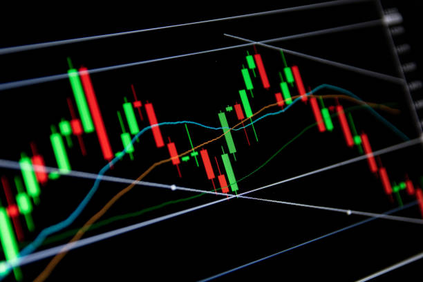 Forex concept : Candlestick chart red green in financial market for trading on black color background stock photo