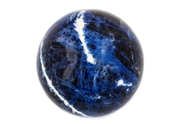 istock Macro mineral stone Sodalite ball on white background 1064250730