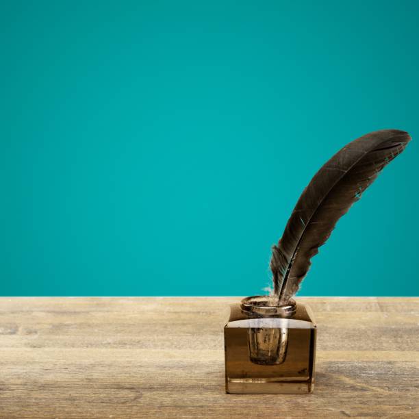 istock Quill pen with inkwell. 1064259818