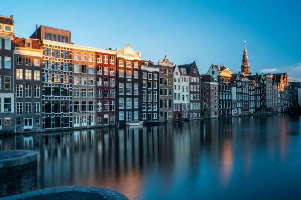 istock Amsterdam Classic Houses at the Canal - Netherlands 1064260074