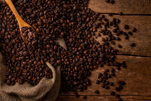 istock From above coffee beans sack with wooden spoon 1064260390