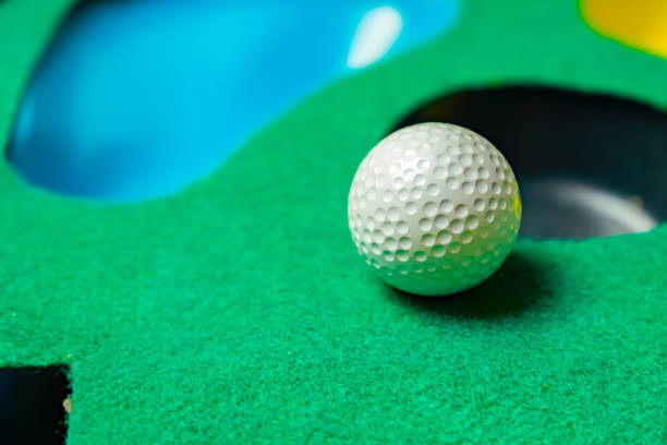 istock Glof ball on putting mat 1064260424
