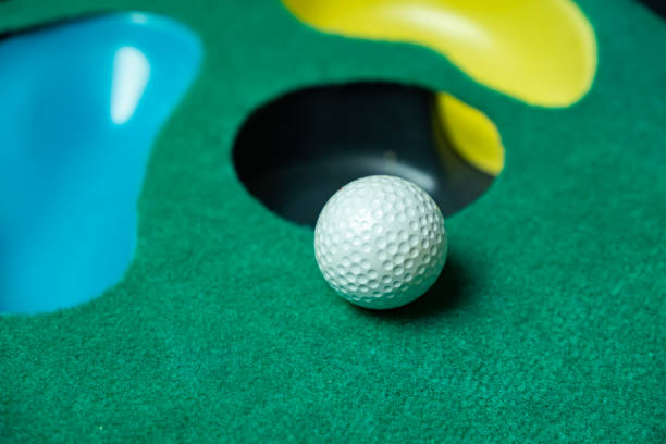 istock Glof ball on putting mat 1064260474