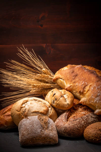 Fresh buns and loaves in arrangement stock photo