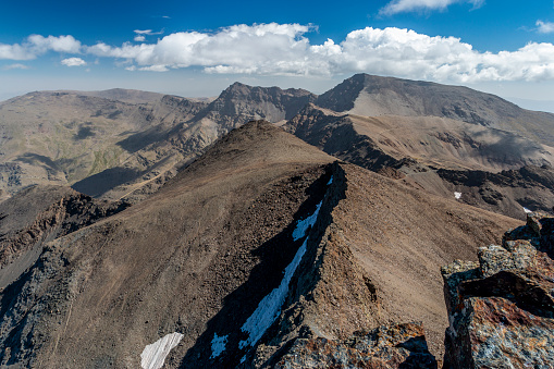 Breathtaking view of Mulhacen from Veleta mountain ridge in Sierra Nevada, Granda, Spain