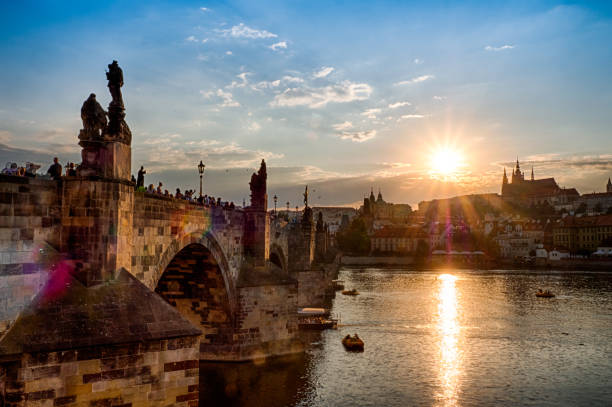 istock Side View of Charles Bridge with sunset in Prague 1064263518