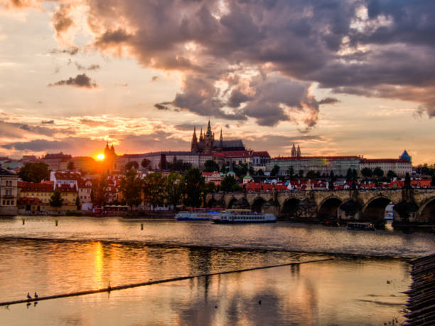 istock St Vitu's Cathedral and Charles Bridge at sunset in Prague 1064263690