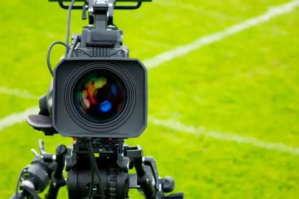 Photo of tv camera in the football stadium before the game