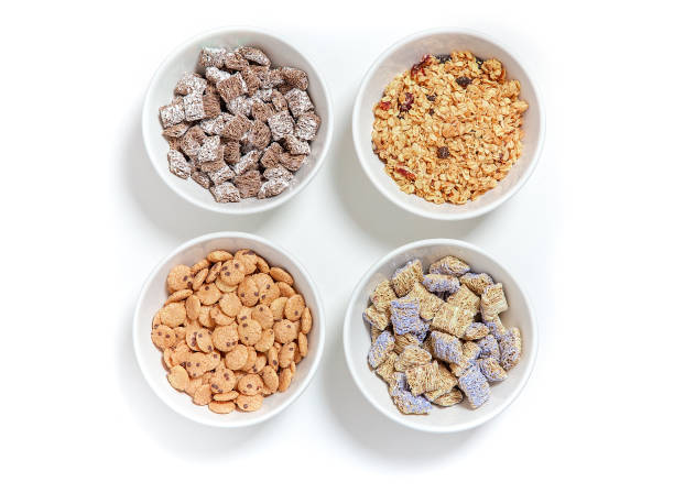 istock bowls of different cereal on a white background. 1064268510