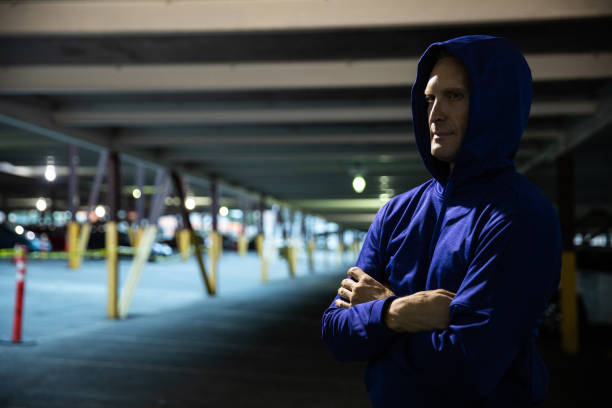 istock Athletic man running and getting fit in the city downtown after work 1064271510